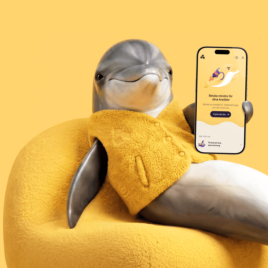 Delfin som håller i en telefon.