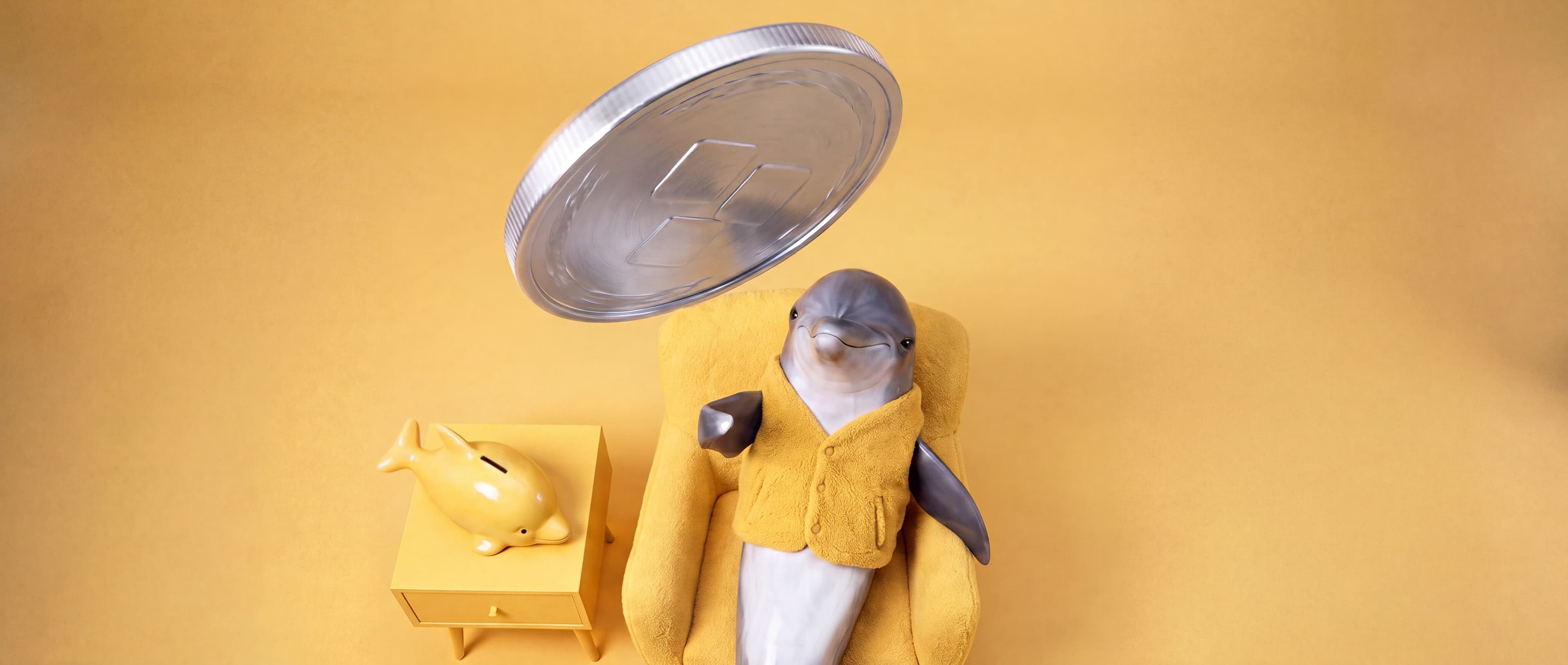 Delfin som lägger ett mynt i en spargris